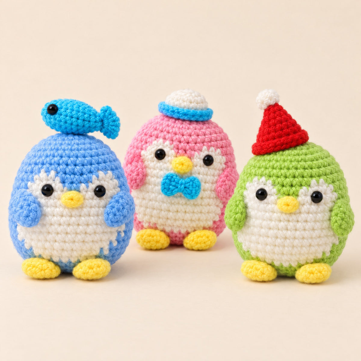 Le trio de pingouins, de face
